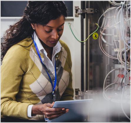 woman troubleshooting equipment